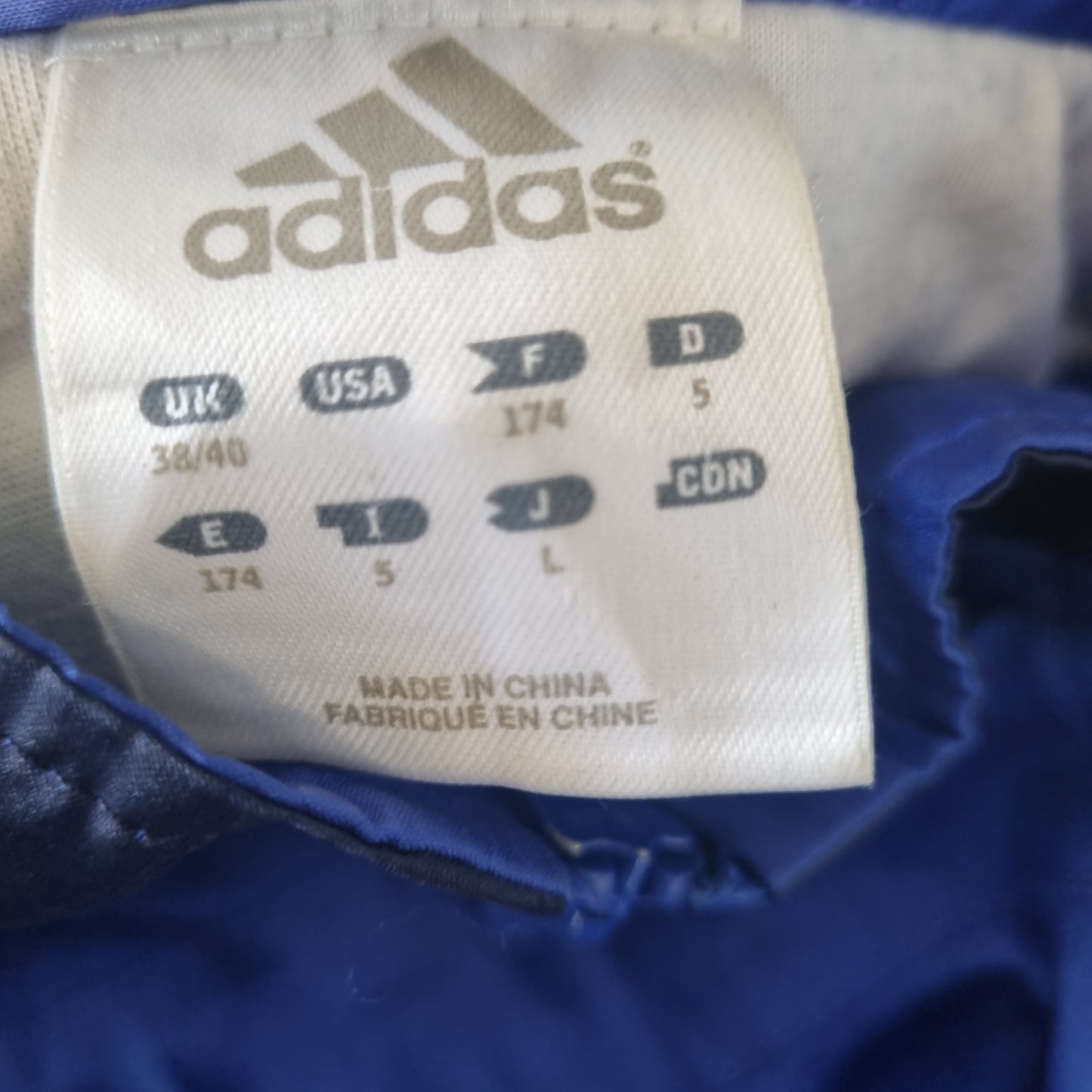 Adidas tussenjas maat L