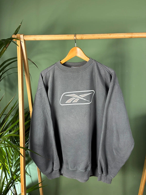 Vintage Reebok logo sweater maat M