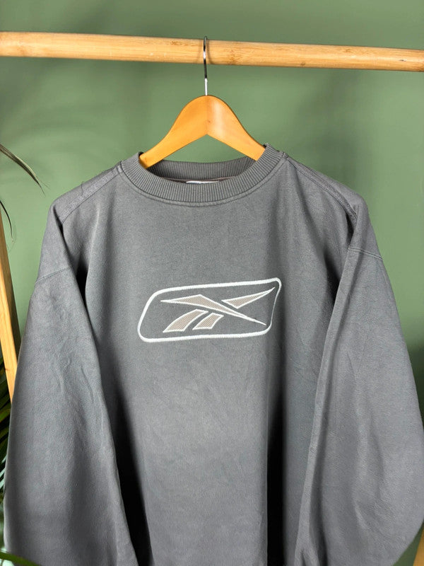 Vintage Reebok logo sweater maat M
