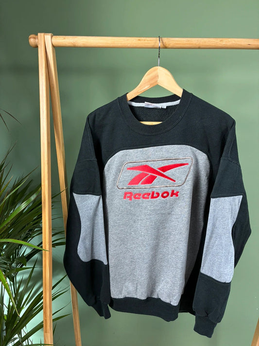 Vintage Reebok logo rework sweater maat L