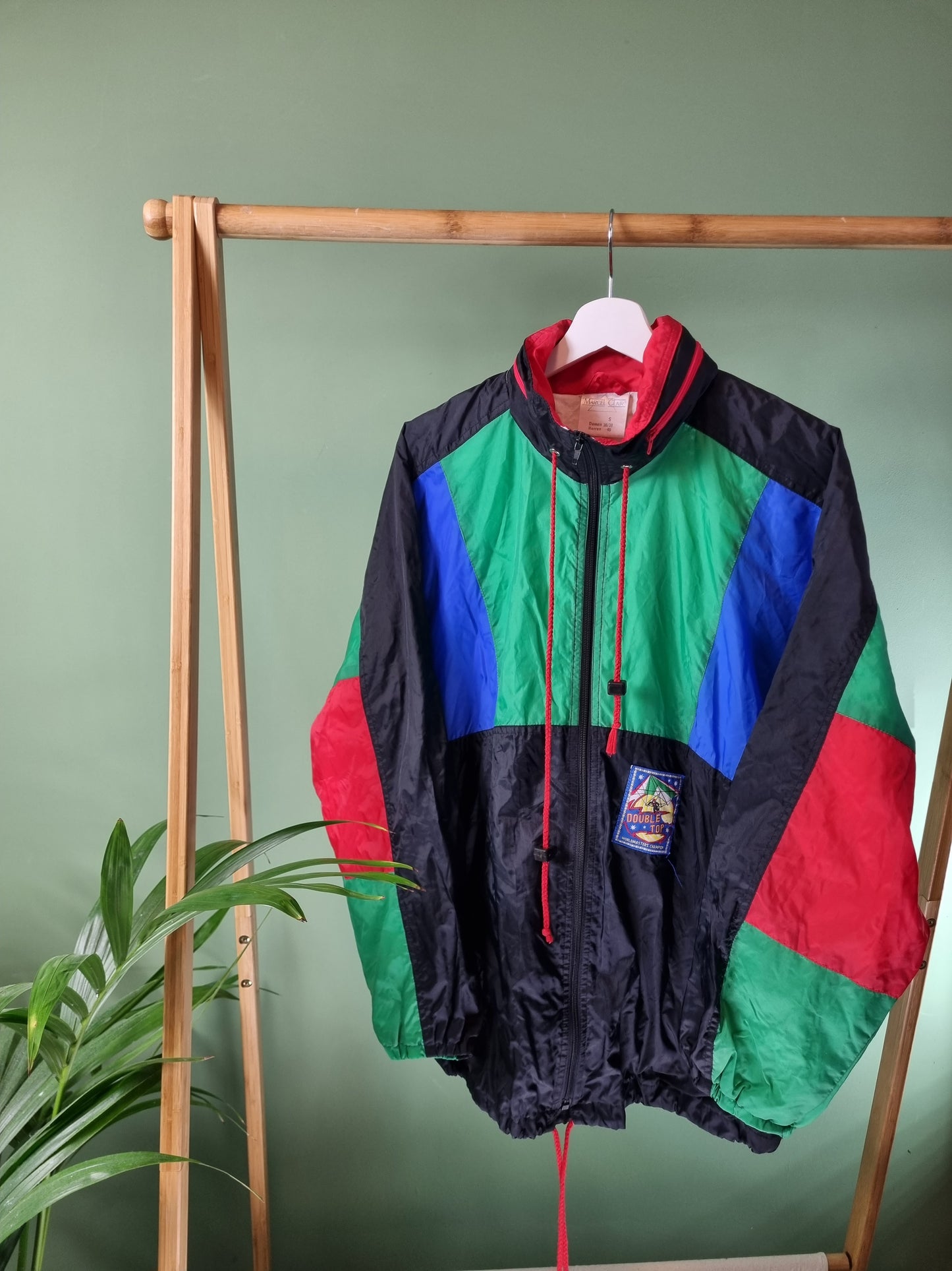 Vintage 80/90s kleuren regenjas maat S